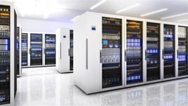 Facility with rows of white data centers